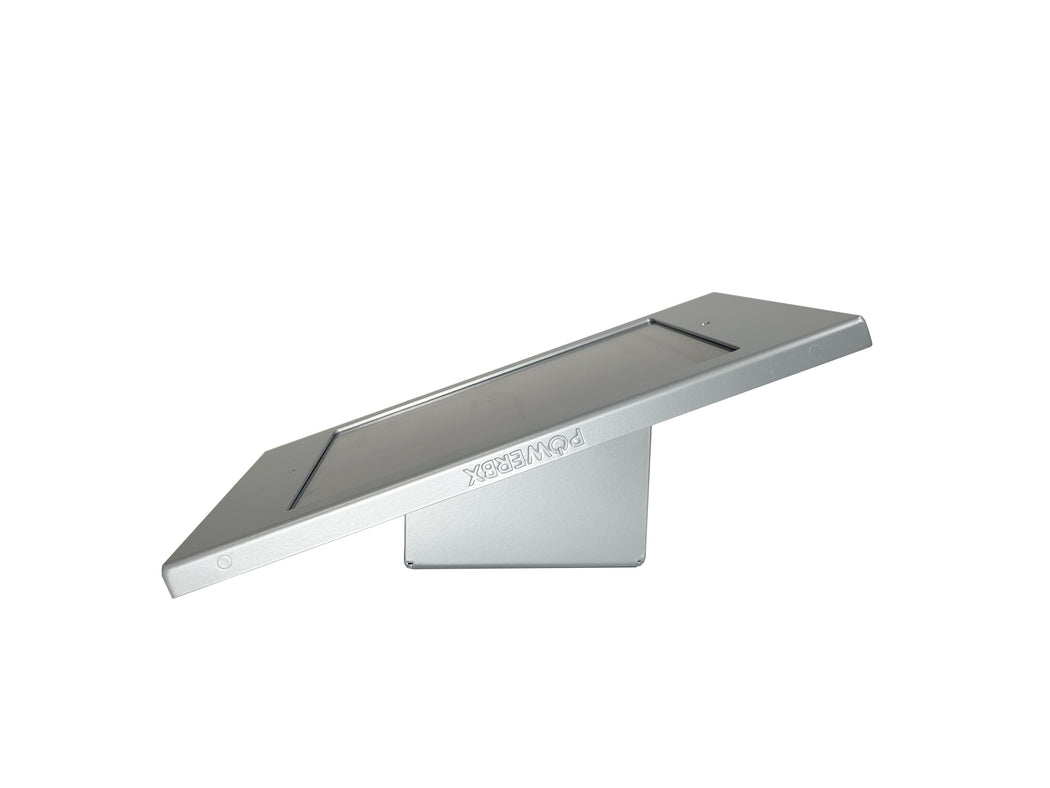 An ADA compliant wall-mounted iPad enclosure in silver color, designed for showcasing room space management software.