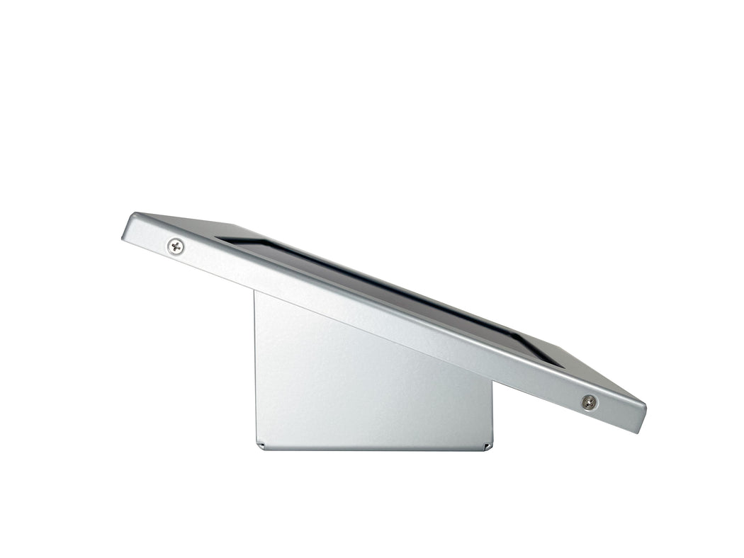 An ADA compliant wall-mounted iPad enclosure in silver color, designed for showcasing room space management software.