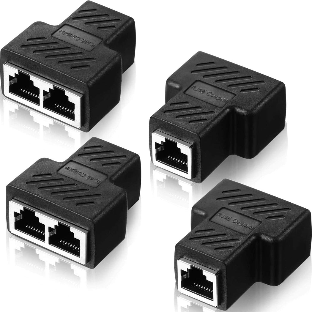 Four black Ethernet cable connectors on a white background